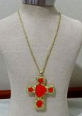 Crucifixo dourado com pedras laranja