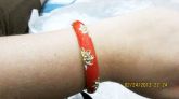 Pulseira laranja com strass