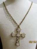 Crucifixo dourado com strass branco