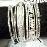 Kit de pulseiras prateadas
