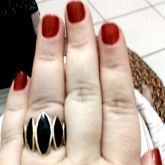 Anel preto com dourado